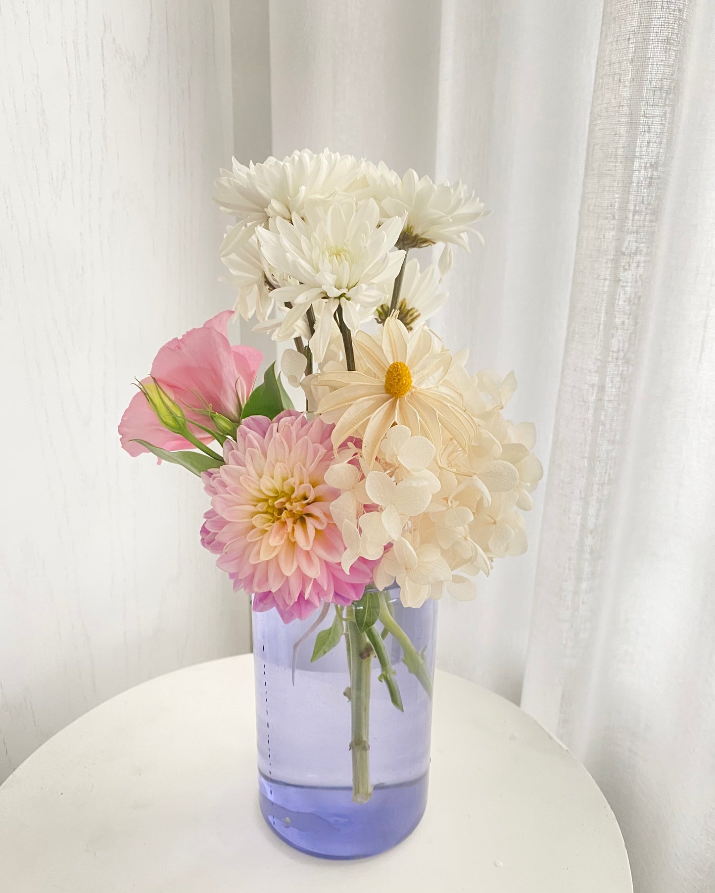 Custom floral arrangement with bud vase hire